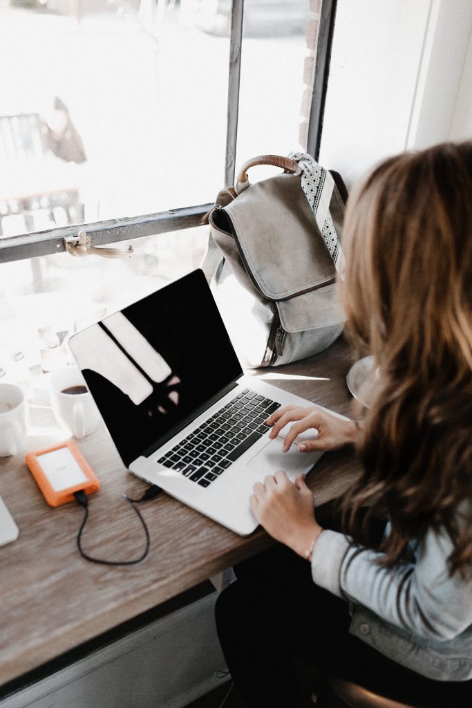 A girl working on her laptop.